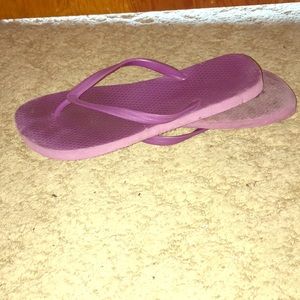 Purple flip flops